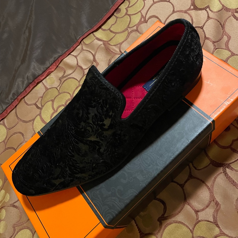 Velvet slip on red bottoms only worn one time. Size 10.5